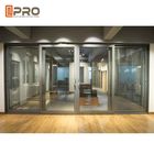 モダンなデザインの粉はオフィス色の任意商業自動スライド ガラス ドアのためのアルミニウム スライディング・ドアに塗った