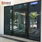 住宅の空気堅さのピボット正面玄関のピボット外部ドア、ピボット蝶番のための透明なガラス アルミニウム ピボット ドア